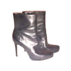 Black leather heeled ankle boots